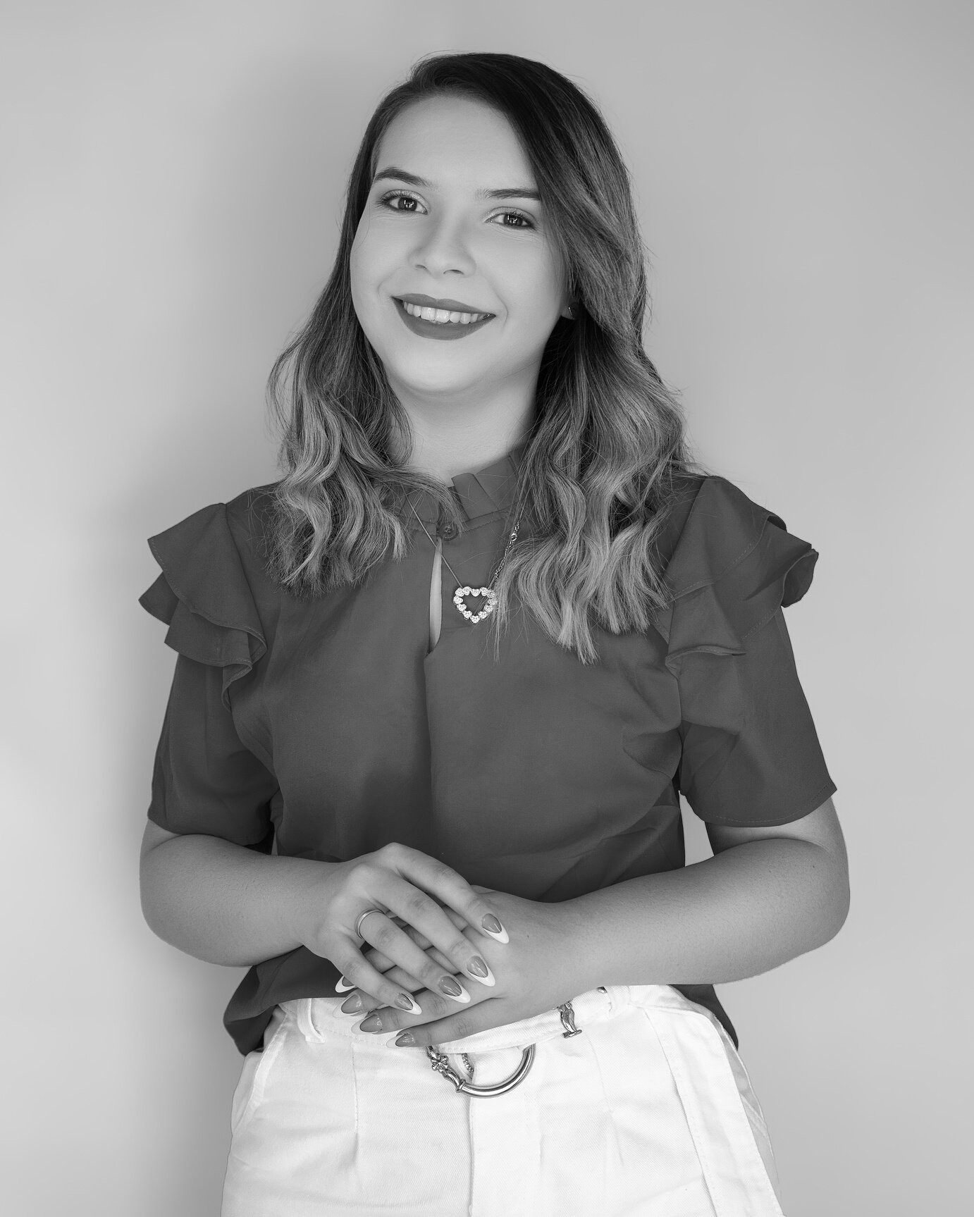 Portrait of a Woman in a Red Top Smiling